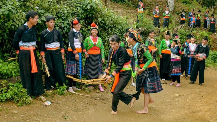 The "khen" – a bamboo mouth organ that creates rhythmic, melodic sounds echoing through the mountains 